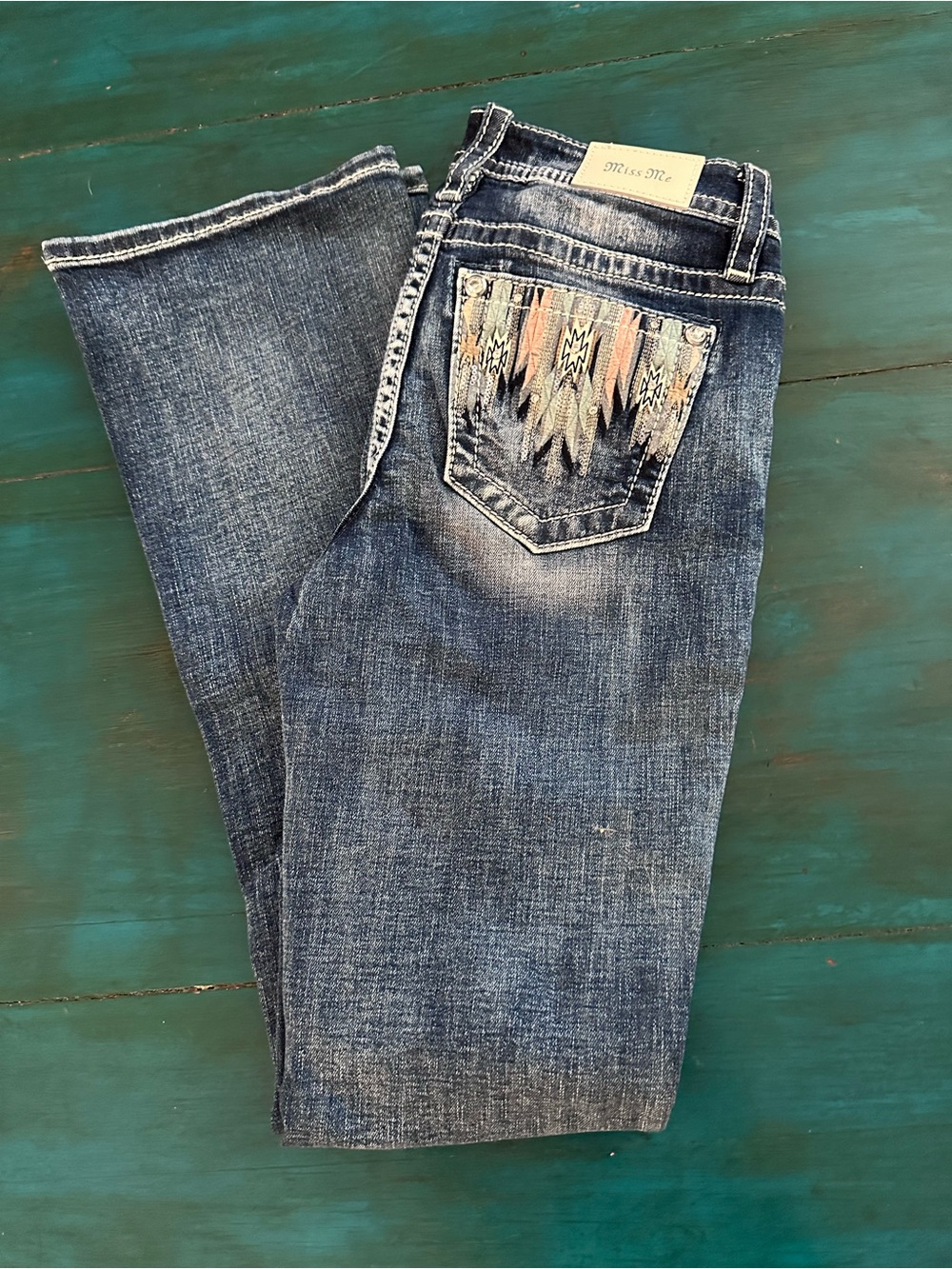 Miss Me Dark Blue Mid-Rise Boot Jeans with Green Lined Pocket